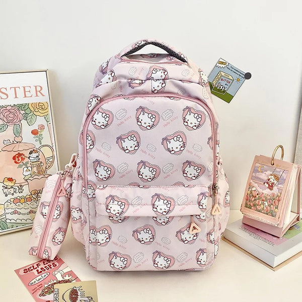 Mochila Impermeable + Estuche “Sanrio”. 45x31x13Cms