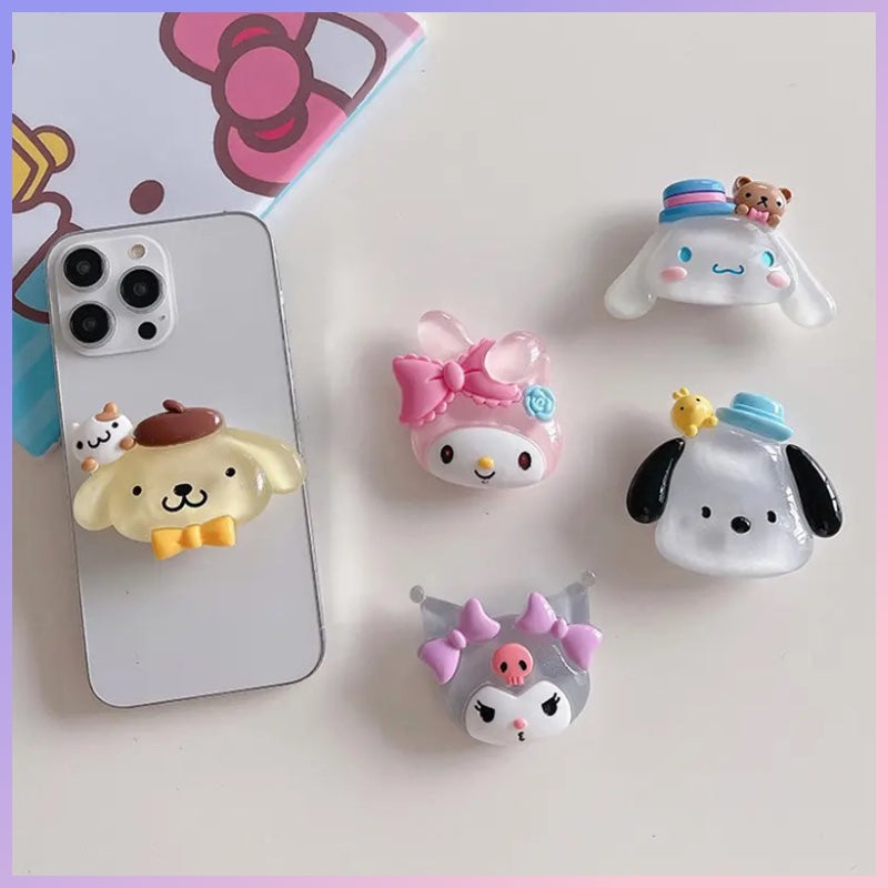 Pop Socket para Celular “Sanrio”. Brilla en la Oscuridad