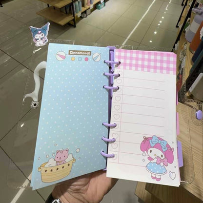 Binder + 80 Hojas + pinza “Sanrio”. 18x10Cms